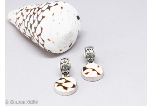 Women's shell and silver earrings